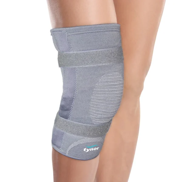 knee cap with rigid hinge